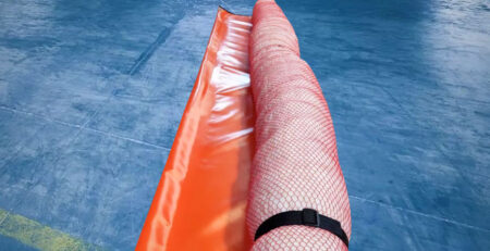 cover for an article about Addressing Comprehensive Oil Spill Control: Oil absorptive boom with skirt